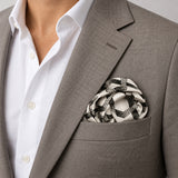 Infinite Geometric Loop pocket square — light jacket · wearing detail.