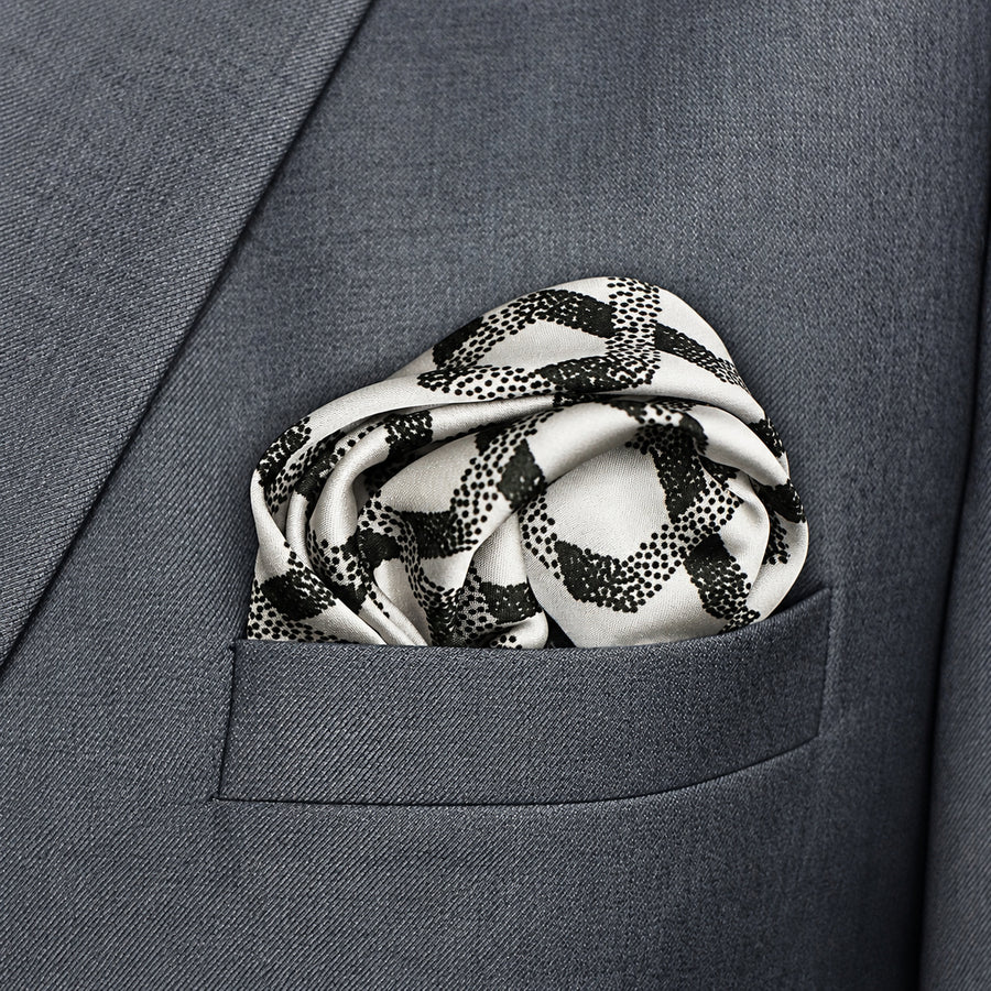 Infinite Geometric Loop pocket square — close-up wearing detail.