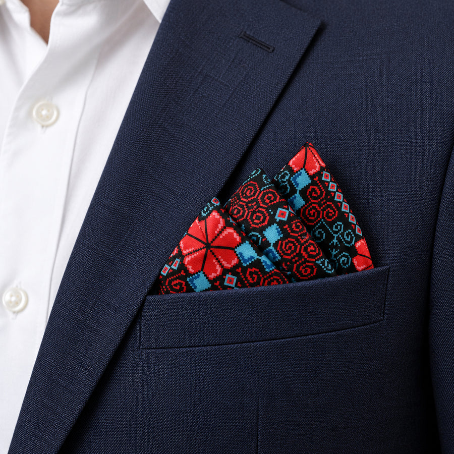 Kaleidoscope pocket square — navy jacket · alternate fold.