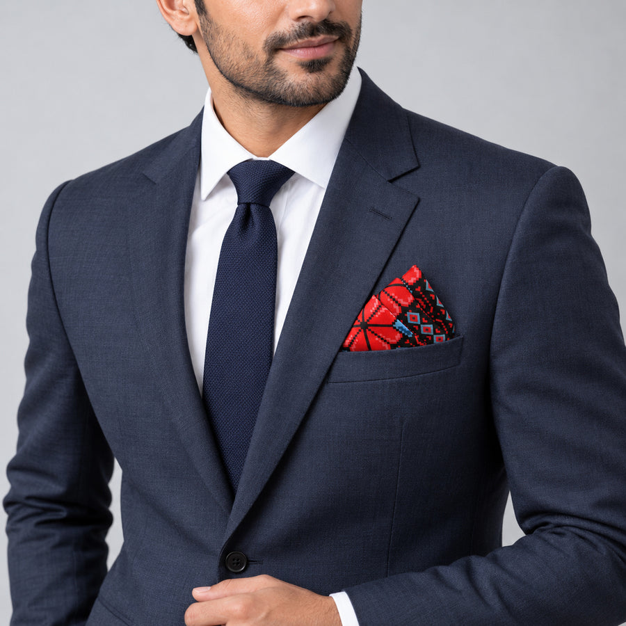 Kaleidoscope pocket square — formal model · navy and tie.