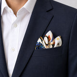 Mandarin Heron White pocket square — navy jacket · alternate fold.