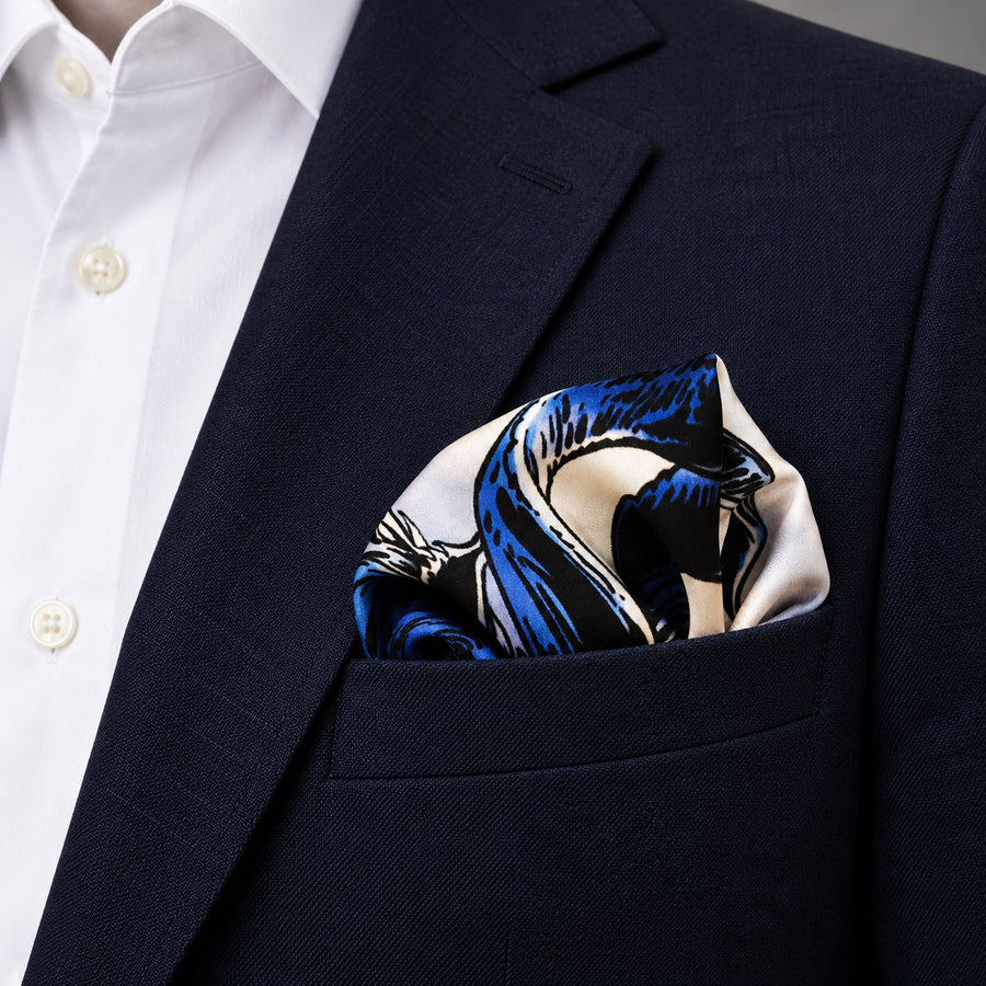 Pakistani Markhor pocket square — navy jacket · wearing detail.