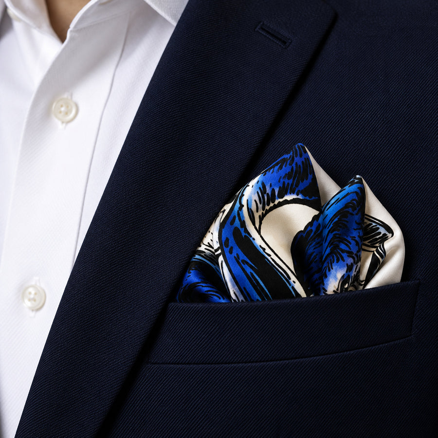 Pakistani Markhor pocket square — navy jacket · alternate fold.