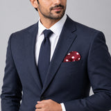 Maroon and White Polka Dots pocket square — formal model · navy and tie.