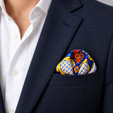 Mexican Talavera pocket square — navy jacket · wearing detail.