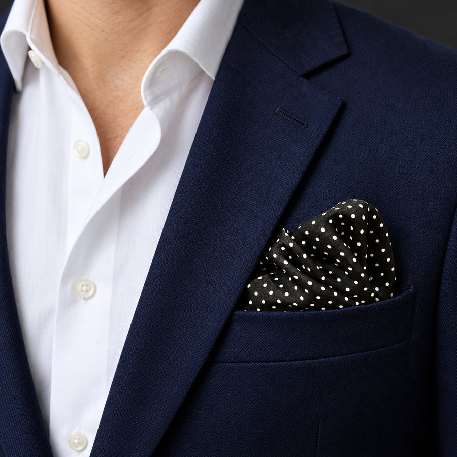 Mini Point Black pocket square — navy jacket · wearing detail.