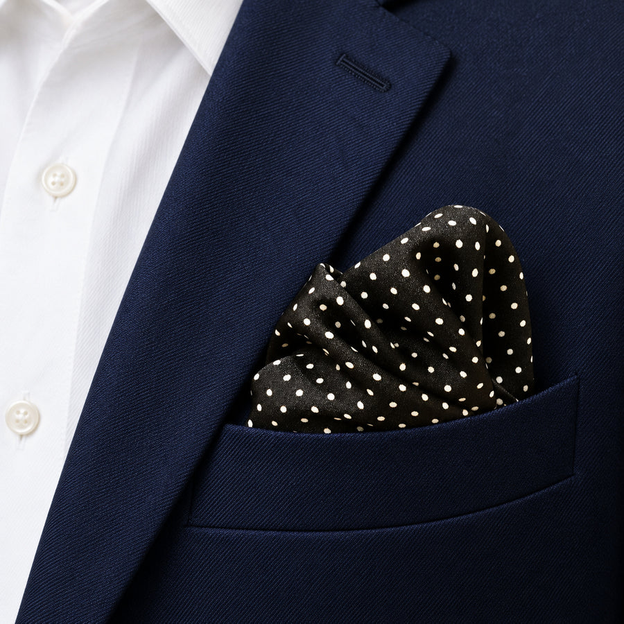 Mini Point Black pocket square — navy jacket · alternate fold.