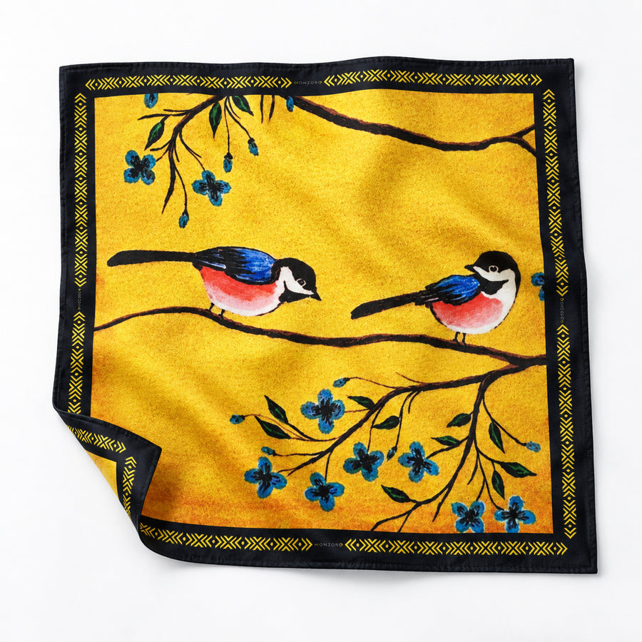 Morning Bird pocket square — unfolded studio detail.