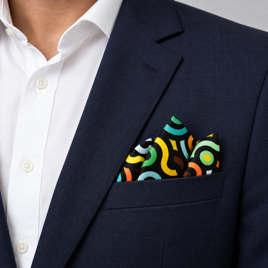 Multi Doodle Art pocket square — navy jacket · alternate fold.