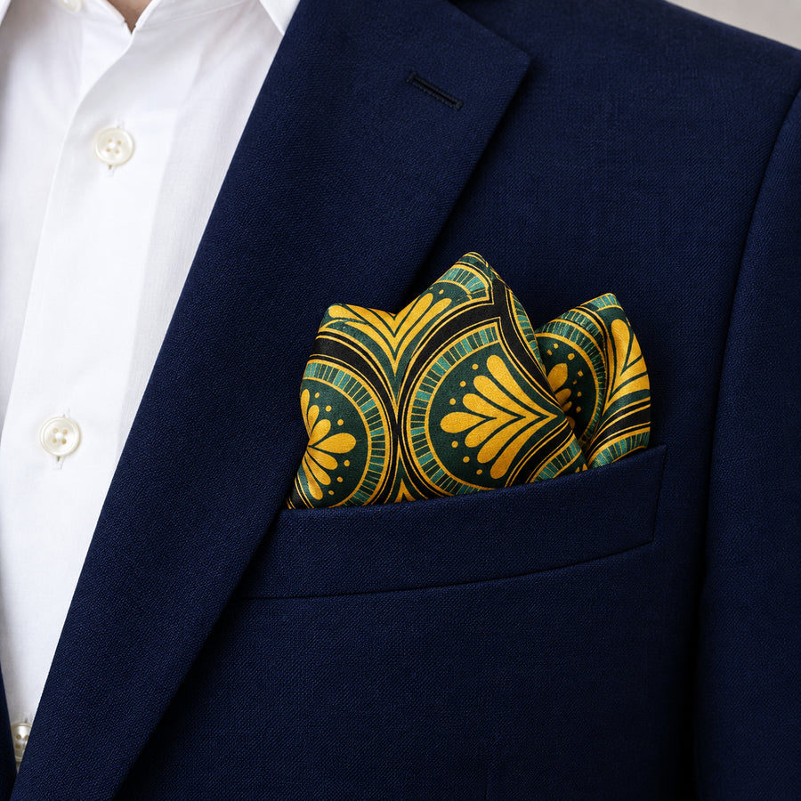 Mustard Botanical pocket square — navy jacket · alternate fold.
