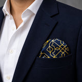 Navy and Gold Rugs pocket square — navy jacket · wearing detail.