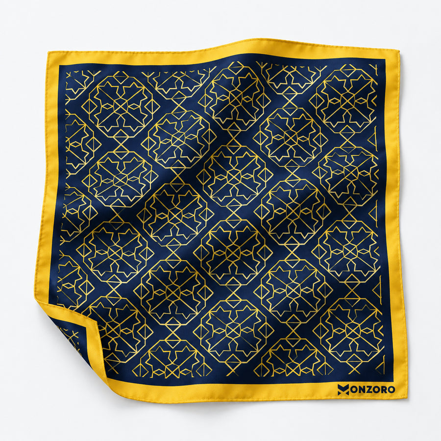 Navy and Gold Rugs pocket square — unfolded studio detail.