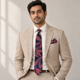 Navy Coral Laurel Leaf silk tie and matching pocket square — Light beige · studio portrait