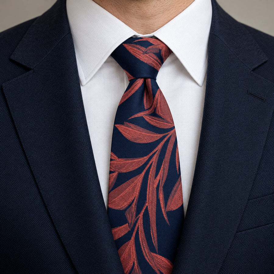 Navy Coral Laurel Leaf Silk Tie — Knot and lapel close-up