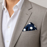 Navy Blue Polka Dots Medium pocket square — light jacket · wearing detail.
