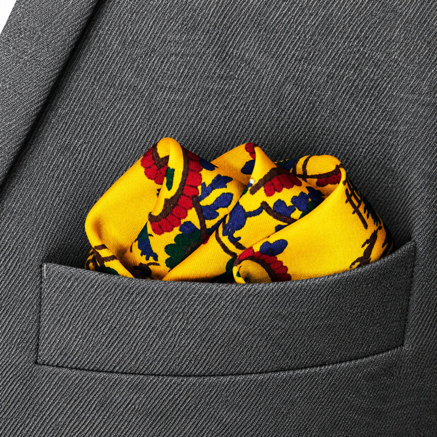 Paisley and Floral Mustard pocket square — close-up wearing detail.