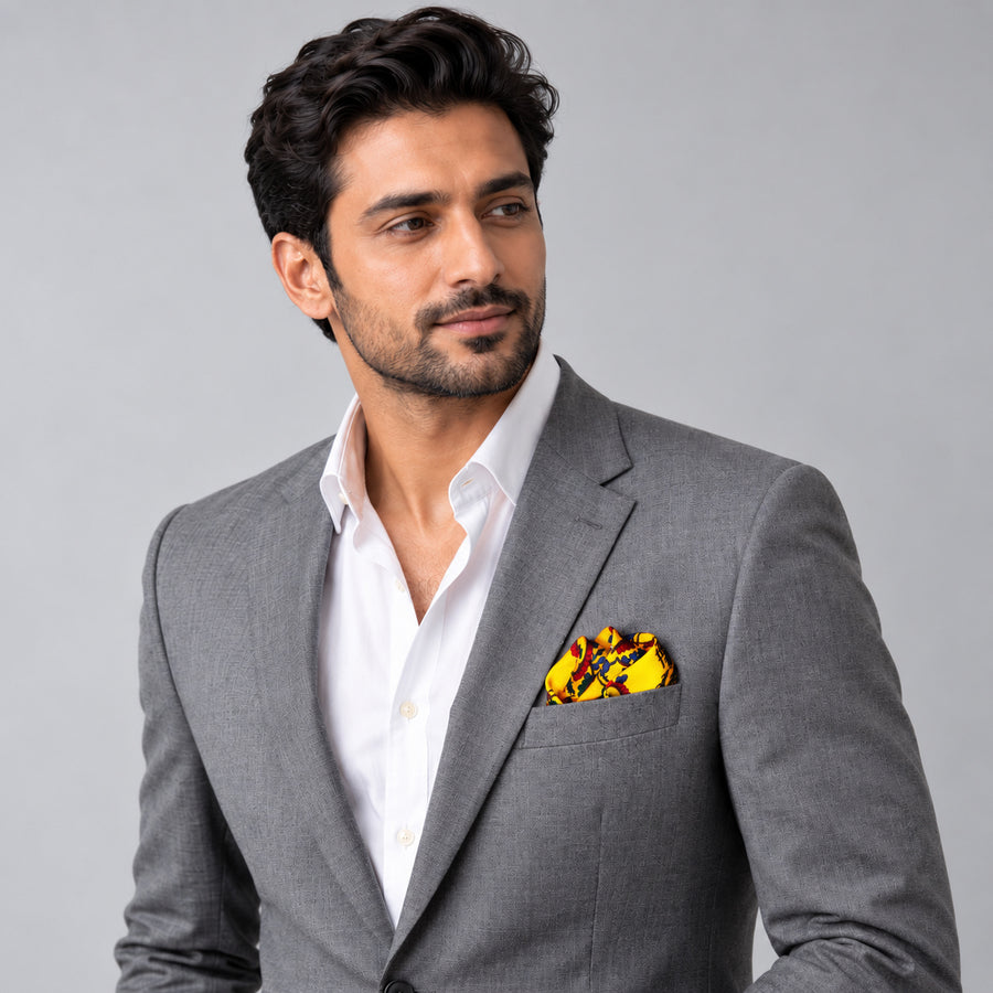 Paisley and Floral Mustard pocket square — model · light grey and open collar.