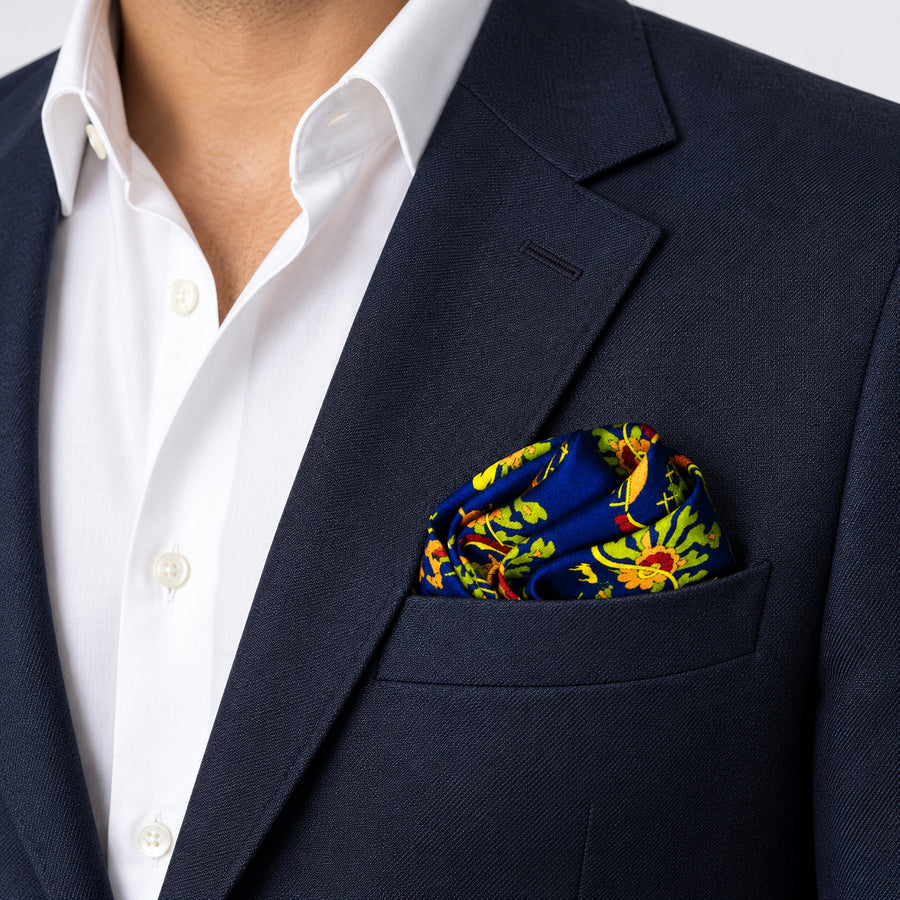 Navy Blue Paisley and Floral pocket square — navy jacket · wearing detail.