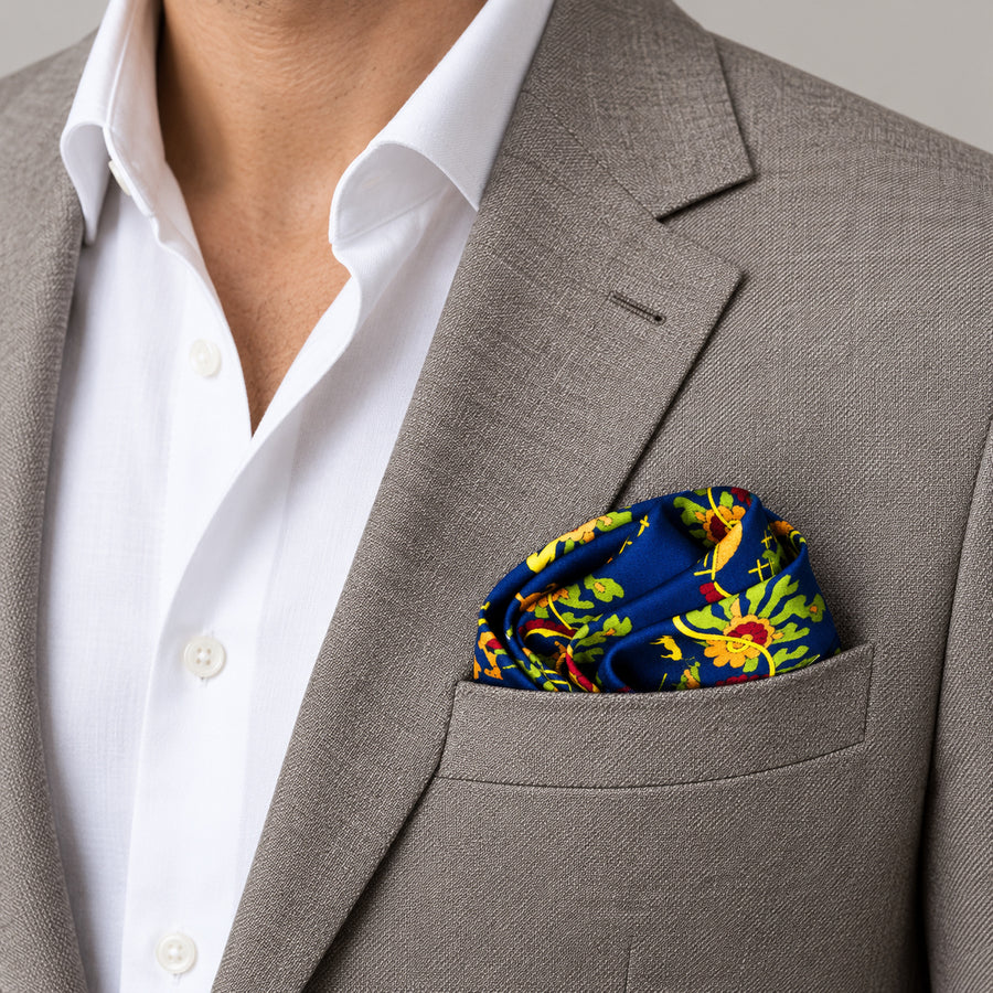 Navy Blue Paisley and Floral pocket square — light jacket · wearing detail.