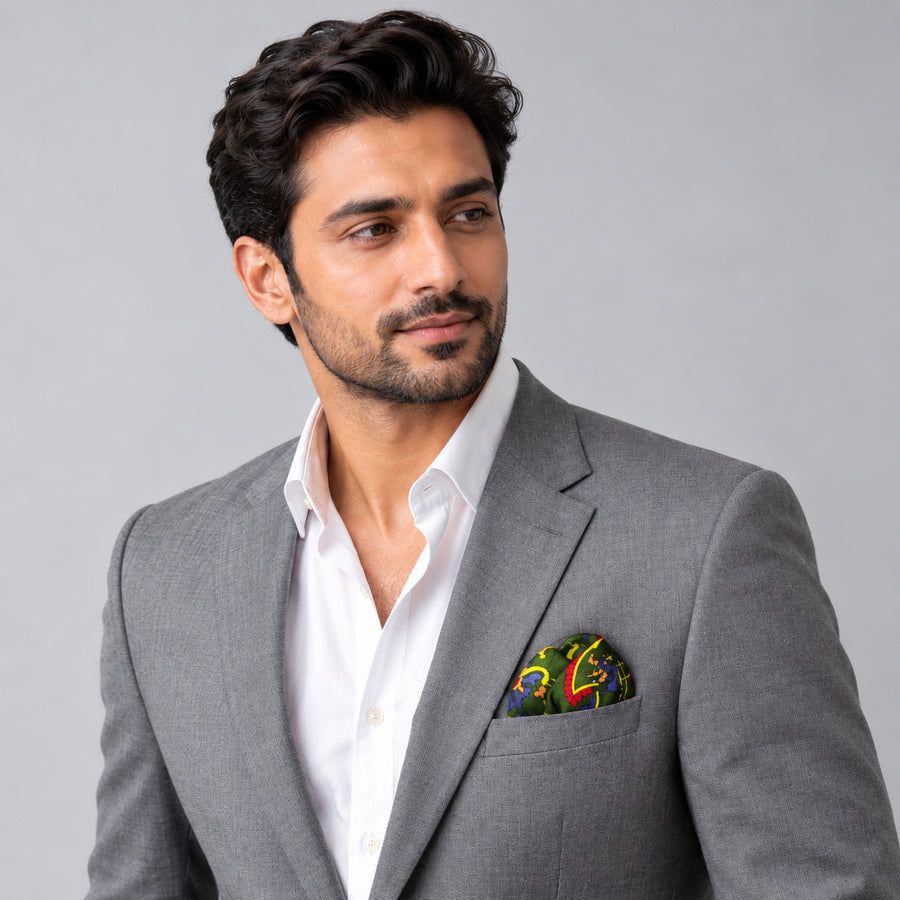 Olive Green Paisley and Floral pocket square — model · light grey and open collar.