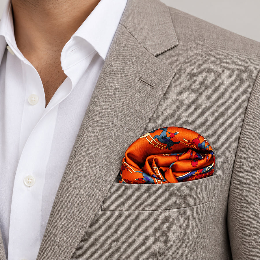 Rust Paisley and Floral pocket square — light jacket · wearing detail.