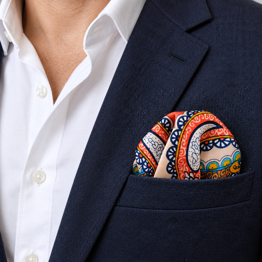 Paisley Art Show pocket square — navy jacket · wearing detail.