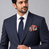 Paisley Art Show pocket square — formal model · navy and tie.