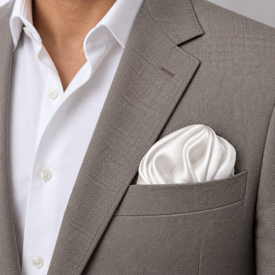 Pearl White Paradigm pocket square — light jacket · wearing detail.