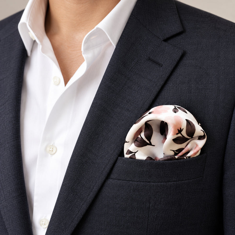 Pink and Grey pocket square — navy jacket · wearing detail.