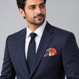 Sapphire Bouquet pocket square — formal model · navy and tie.