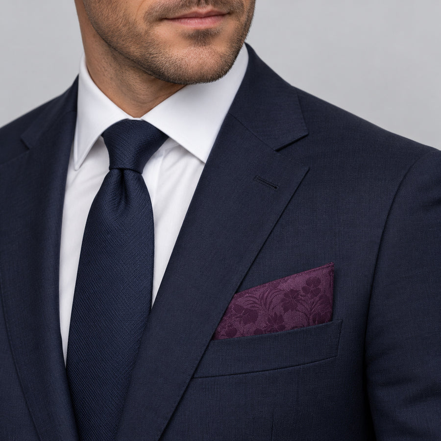 Plum Tropical Bloom Silk Pocket Square — formal model · navy and tie.