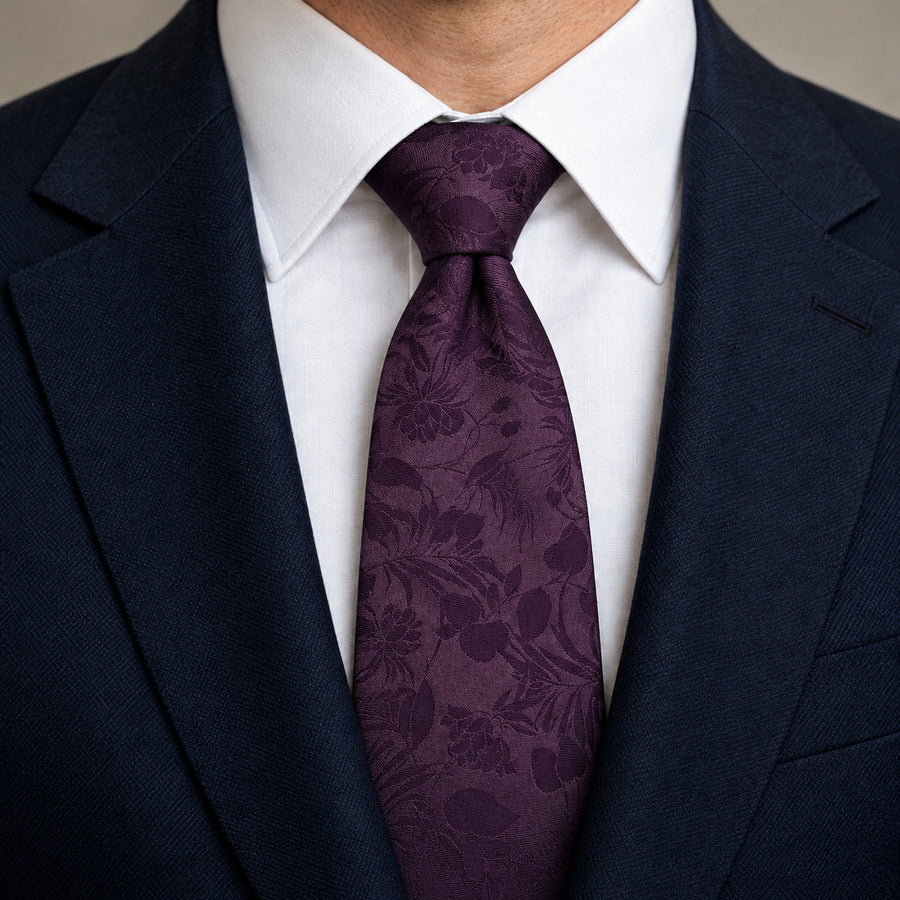 Plum Tropical Bloom Silk Tie — Knot and lapel close-up