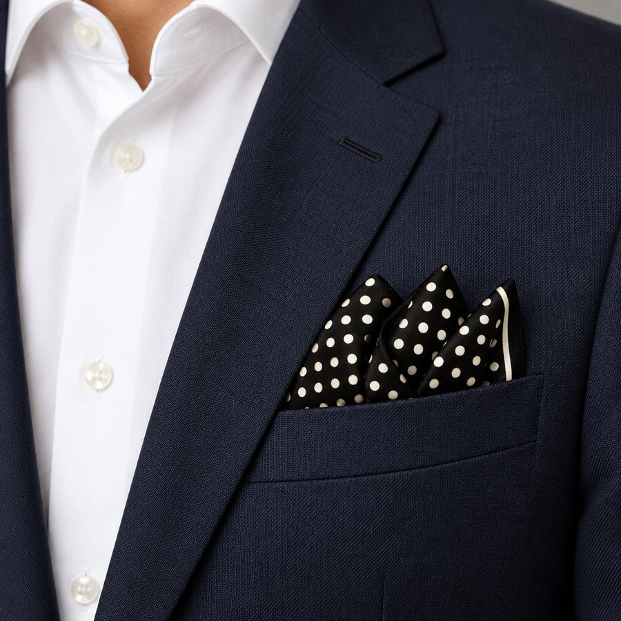 Point Black pocket square — navy jacket · alternate fold.