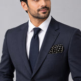 Point Black pocket square — formal model · navy and tie.