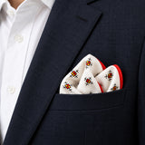Red Potion pocket square — navy jacket · alternate fold.