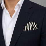Retro Run pocket square — navy jacket · wearing detail.