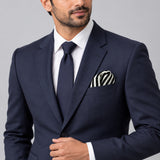 Retro Run pocket square — formal model · navy and tie.