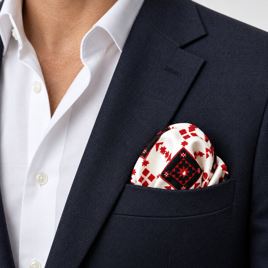 Romanian Traditional pocket square — navy jacket · wearing detail.