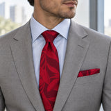 Scarlet Laurel Leaf silk tie and matching pocket square — Stone grey · pale blue shirt