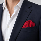 Scarlet Laurel Leaf Silk Pocket Square — navy jacket · rounded puff.
