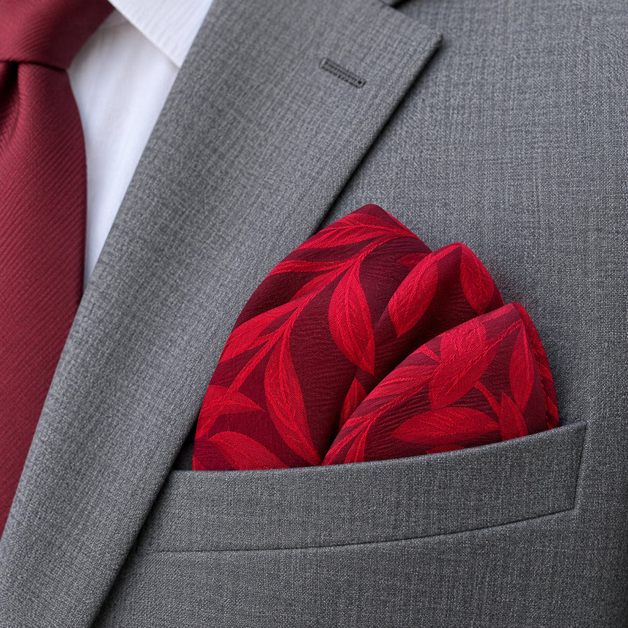 Scarlet Laurel Leaf Silk Pocket Square — close-up wearing detail.