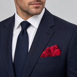 Scarlet Laurel Leaf Silk Pocket Square — formal model · navy and tie.