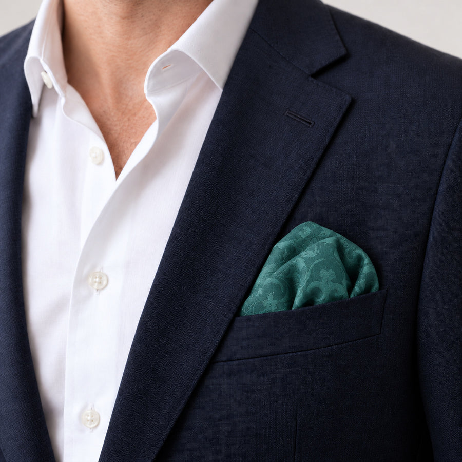 Sea Green Scroll Damask Silk Pocket Square — Navy jacket · rounded puff