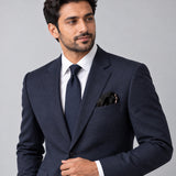 Seamless Geometric Dotted pocket square — formal model · navy and tie.