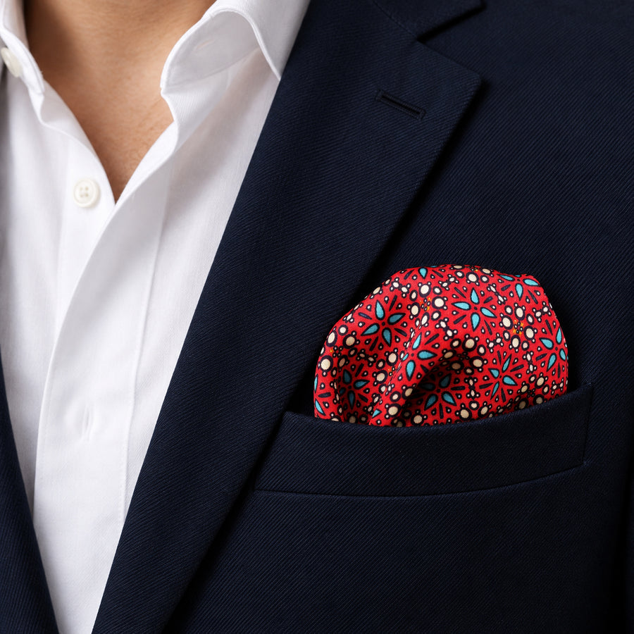 Seamless Repeat Pattern pocket square — navy jacket · wearing detail.
