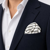 Sleek Black & White Stripes pocket square — navy jacket · wearing detail.
