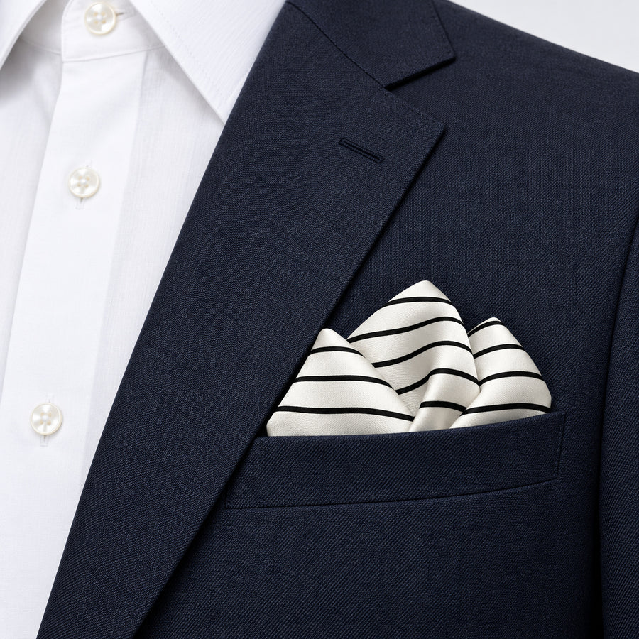 Sleek Black & White Stripes pocket square — navy jacket · alternate fold.