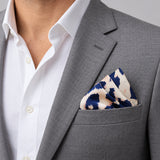 Snow Leopard pocket square — light jacket · wearing detail.