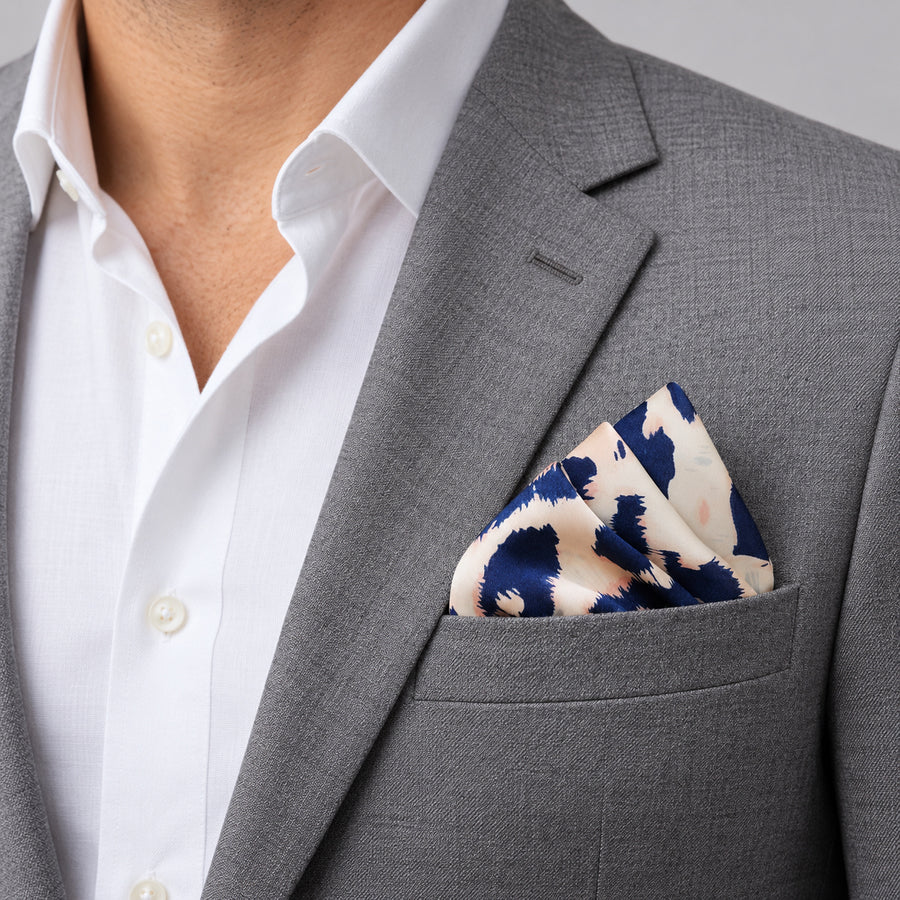 Snow Leopard pocket square — light jacket · wearing detail.