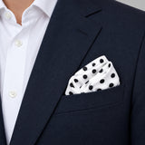 Snow White Base Polka pocket square — navy jacket · alternate fold.